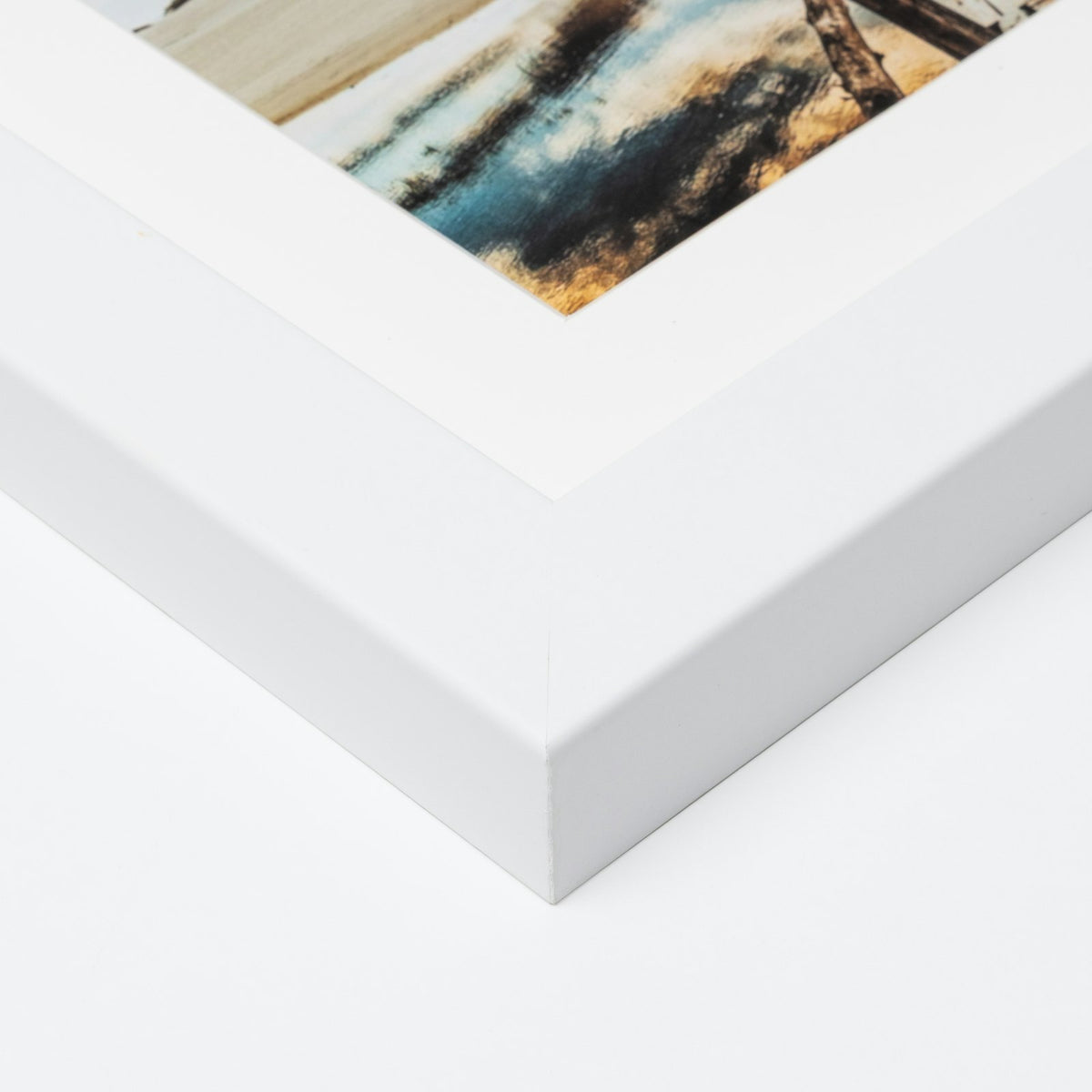 Corner of a white gallery frame
