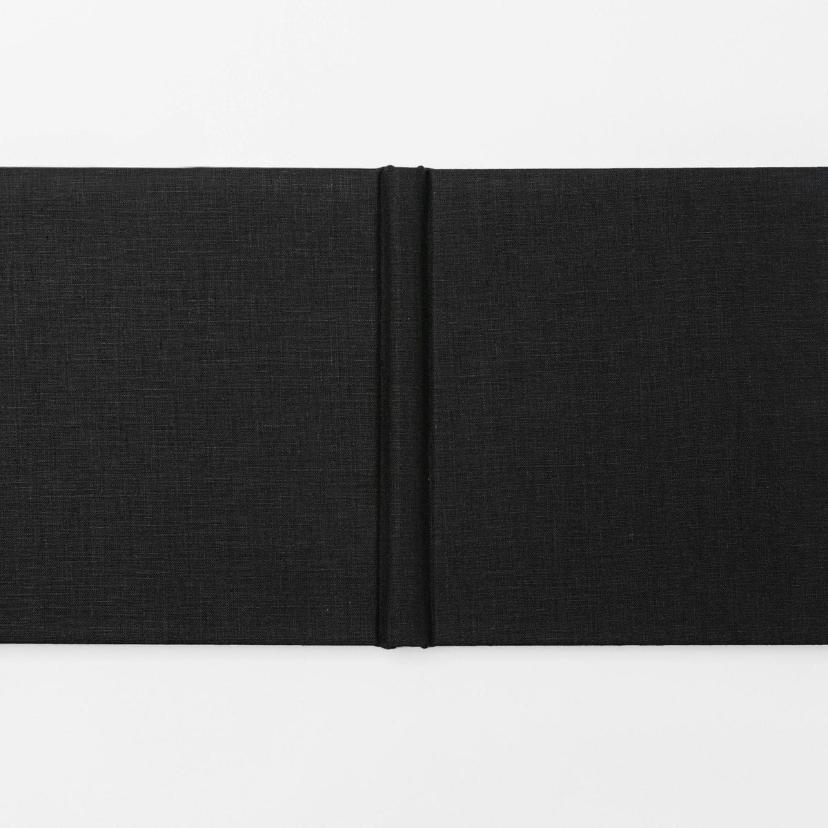 Photo book with a black fabric cover