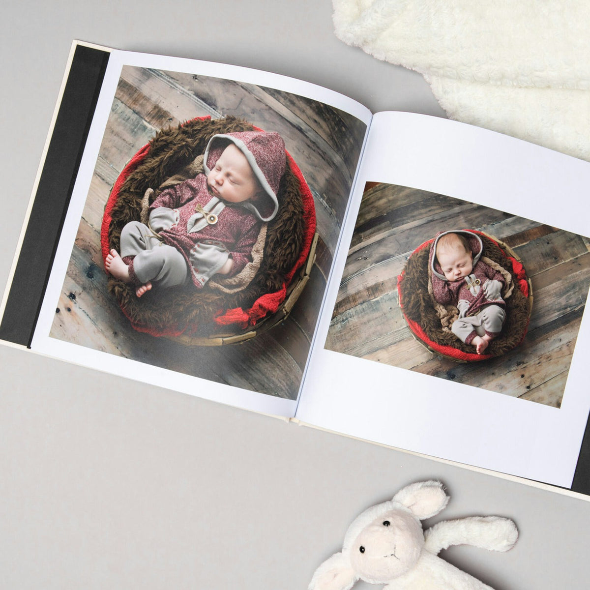 Hardcover photo book open on a table