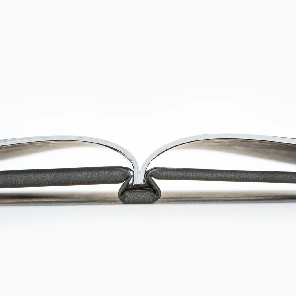 Side view of a hardcover photo book showing the bound spine