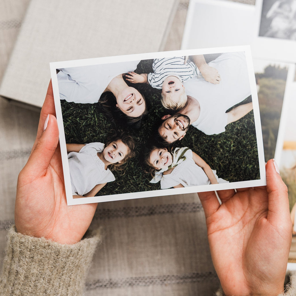 Hands holding a lustre print