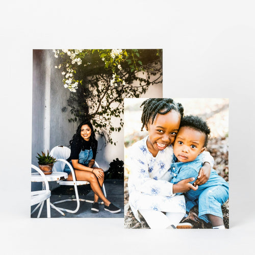 Large lustre prints of a seated woman and two children