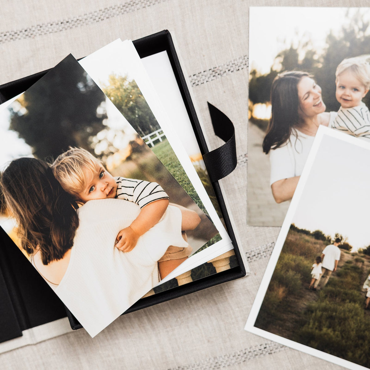 Box of lustre prints of a mother and child
